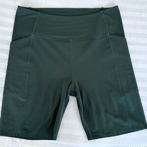 Girlfriend Collective High Rise Pocket Bike Short in Moss